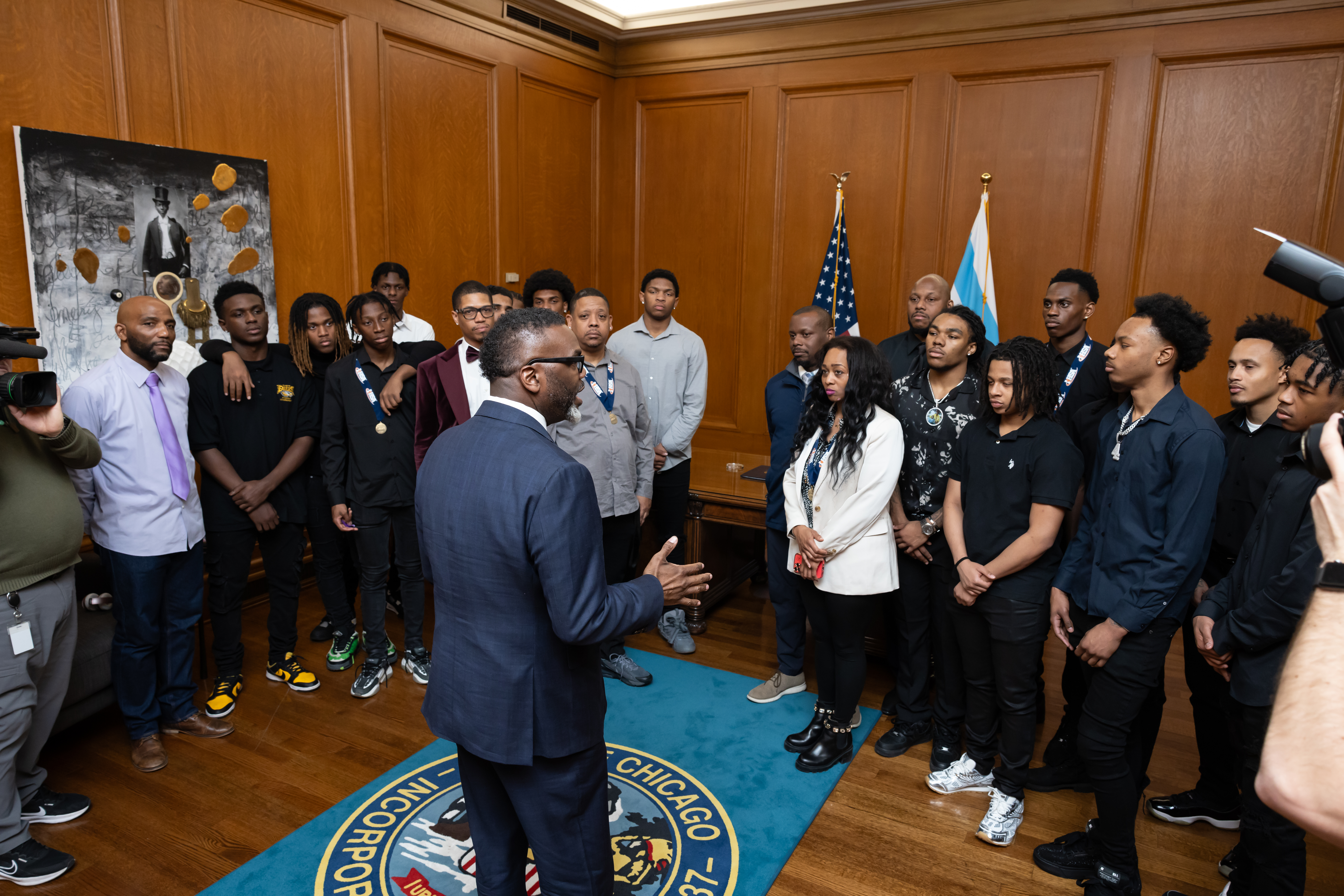 Mayor Johnson welcomes student-athletes from Dyett High School to City Hall after their men's basketball team became 2A State Champions.